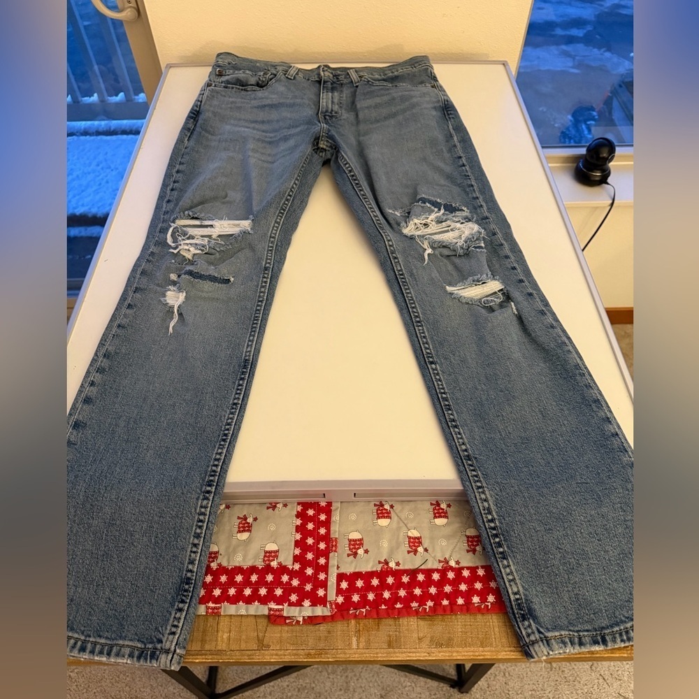 Levi's Light Blue Distressed Straight Leg Jeans